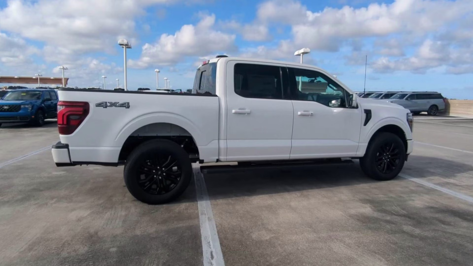 2026 Star White Metallic Tri-Coat Ford F-150 LARIAT Crew Cab Pickup 4X4 Truck