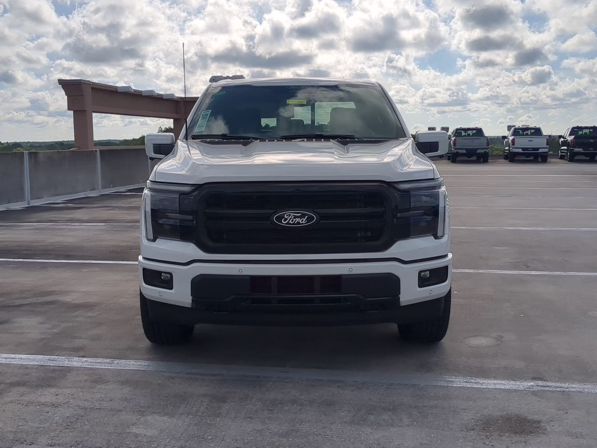 2026 Star White Metallic Tri-Coat Ford F-150 LARIAT Crew Cab Pickup 4X4 Truck