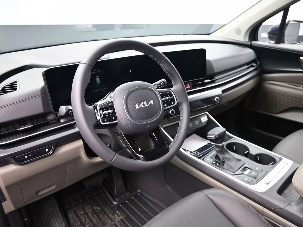 2026 Deep Chroma Blue Kia Carnival LXS FWD Van