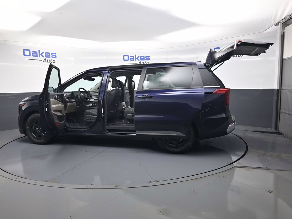 2026 Deep Chroma Blue Kia Carnival LXS FWD Van