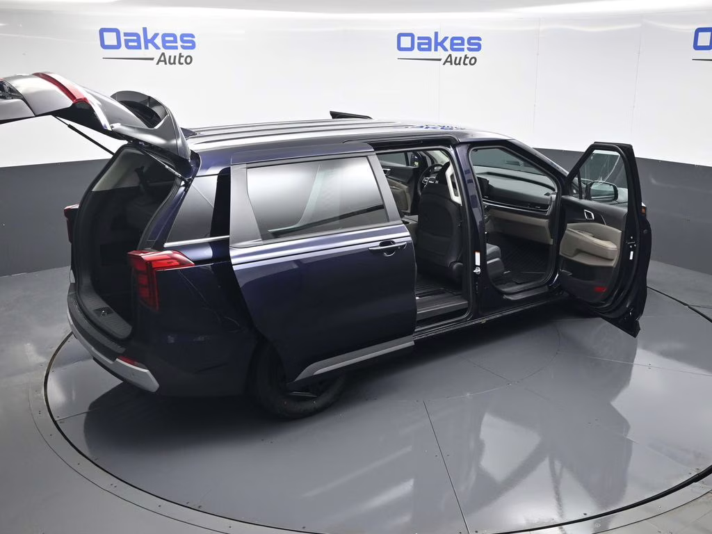 2026 Deep Chroma Blue Kia Carnival LXS FWD Van