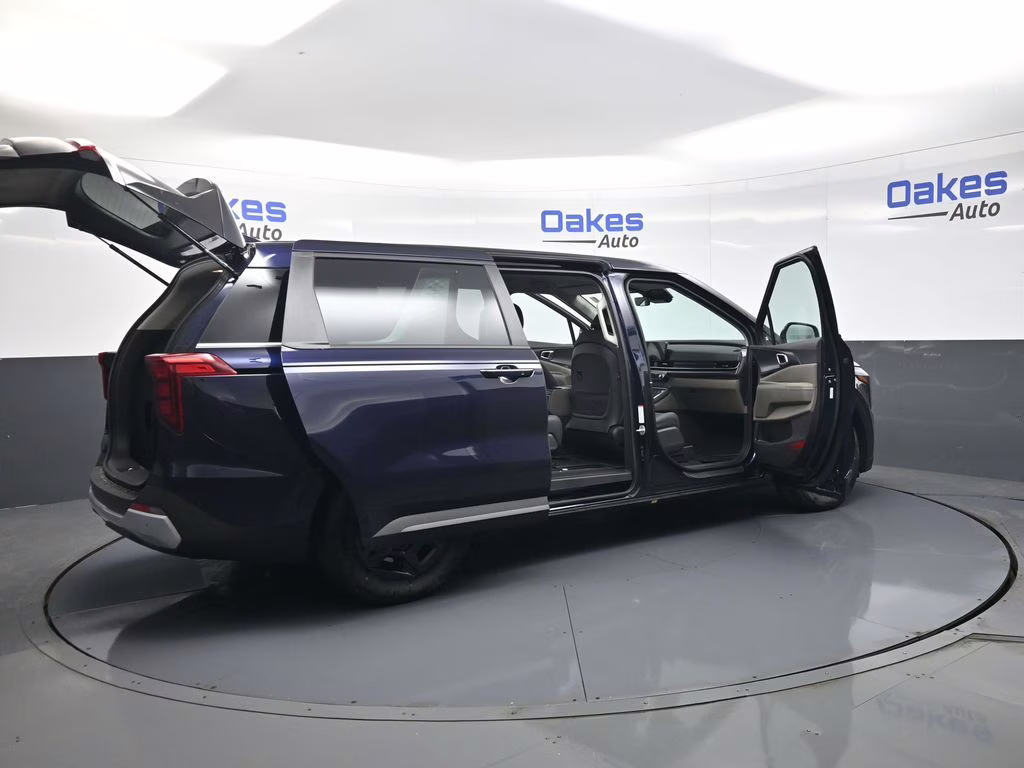 2026 Deep Chroma Blue Kia Carnival LXS FWD Van