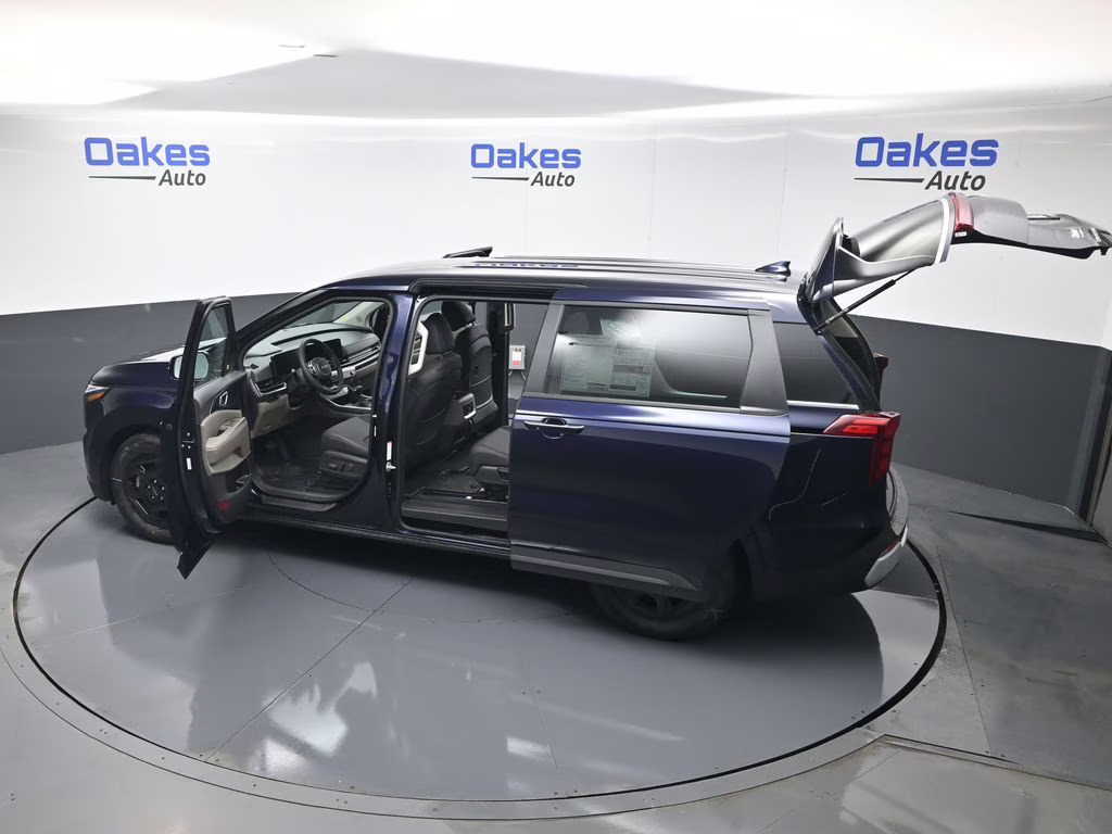 2026 Deep Chroma Blue Kia Carnival LXS FWD Van