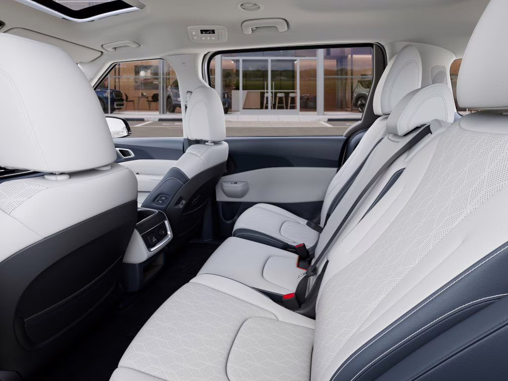 2026 Snow White Pearl Kia Carnival SX FWD Van