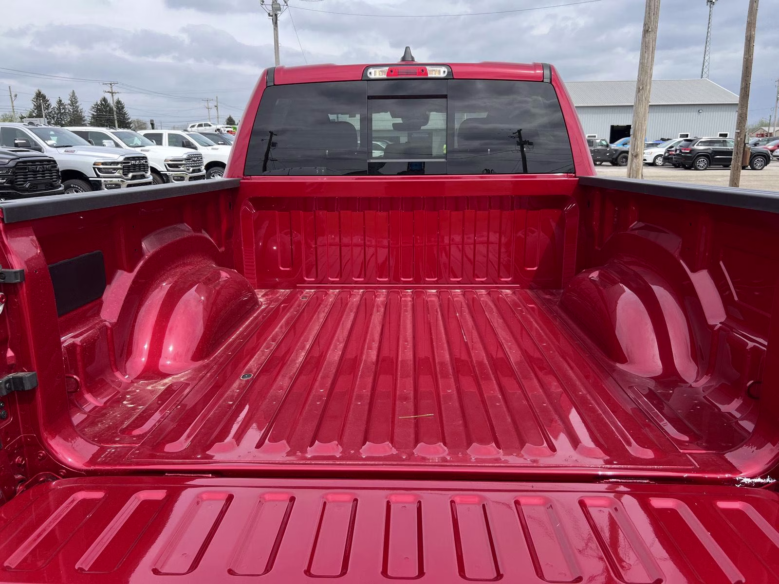 2026 Molten Red Pearlcoat Ram 1500 Big Horn 4X4 Truck