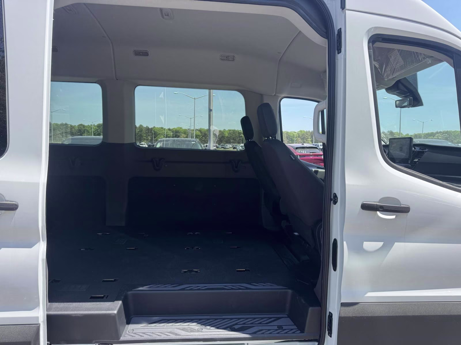 2026 Oxford White Ford Transit Passenger Wagon T-350 148 Med Roof XLT AWD AWD Van