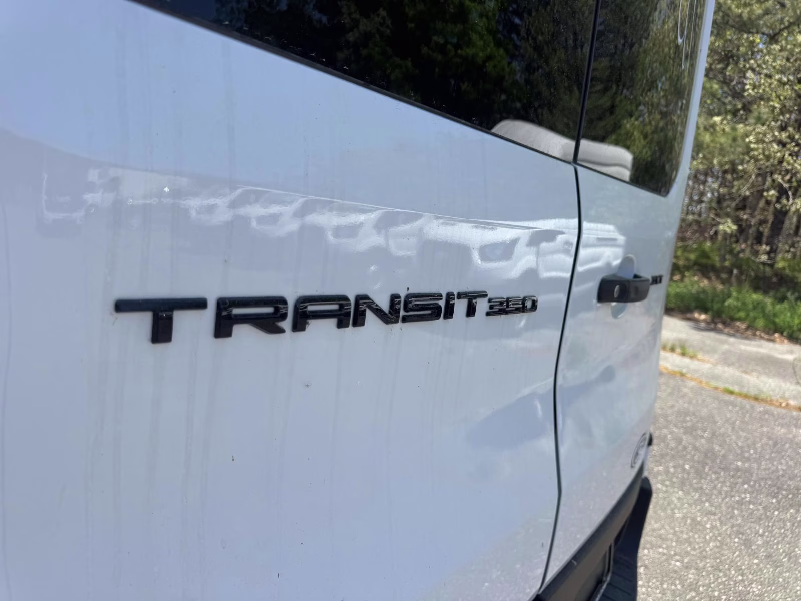 2026 Oxford White Ford Transit Passenger Wagon T-350 148 Med Roof XLT AWD AWD Van