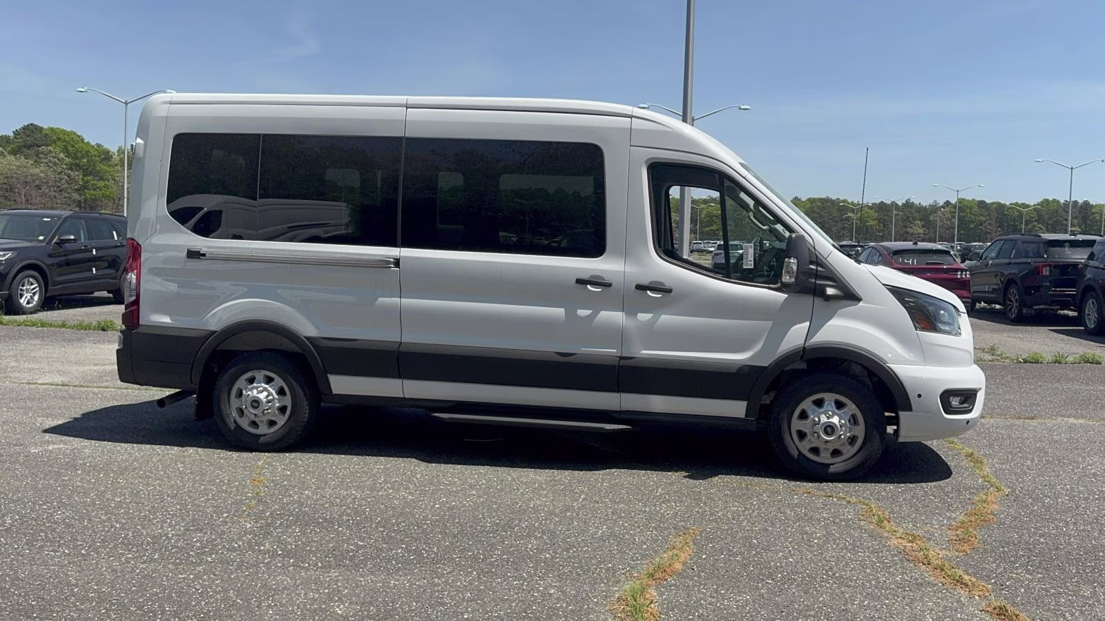 2026 Oxford White Ford Transit Passenger Wagon T-350 148 Med Roof XLT AWD AWD Van