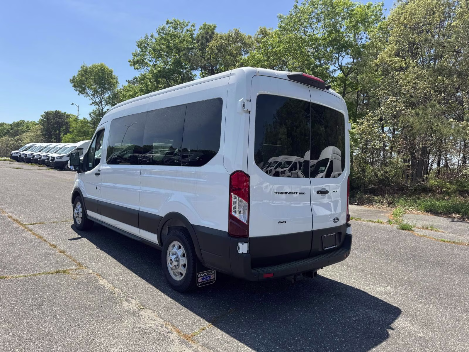 2026 Oxford White Ford Transit Passenger Wagon T-350 148 Med Roof XLT AWD AWD Van