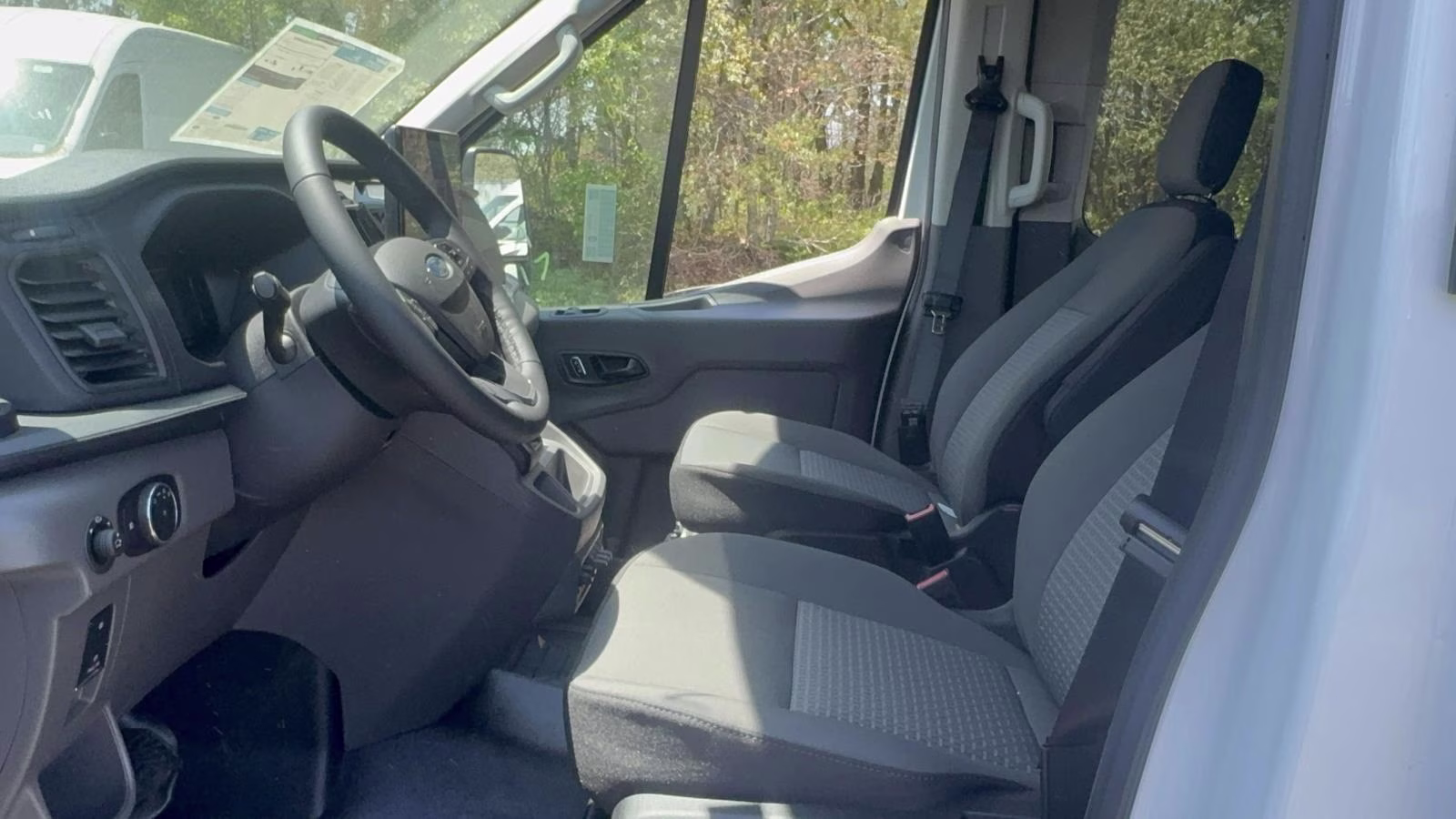 2026 Oxford White Ford Transit Passenger Wagon T-350 148 Med Roof XLT AWD AWD Van