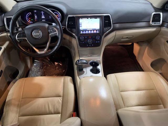 2015 Brilliant Black Crystal Pearlcoat Jeep Grand Cherokee Limited 4X4 SUV