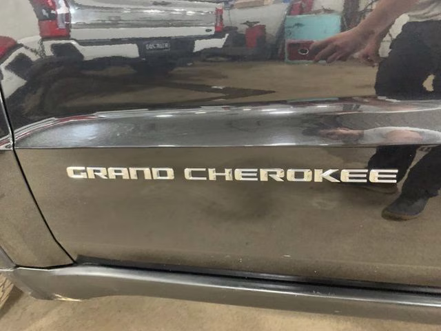 2015 Brilliant Black Crystal Pearlcoat Jeep Grand Cherokee Limited 4X4 SUV