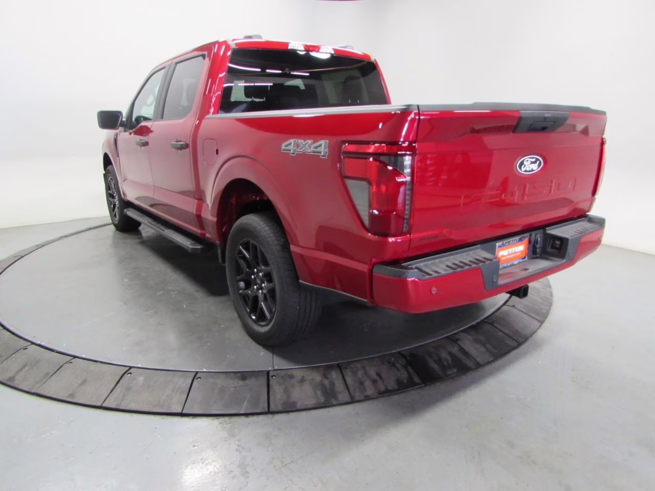 2025 Rapid Red Metallic Tinted Clearcoat Ford F-150 STX 4X4 Truck