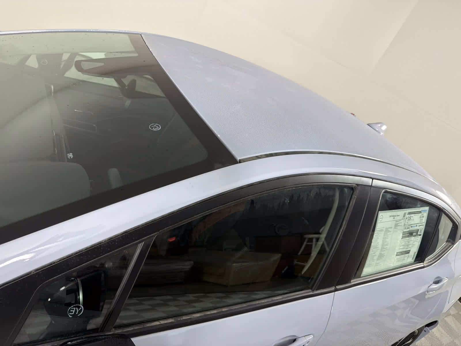 2025 Gray Sky Pearl Nissan Versa SR FWD Sedan