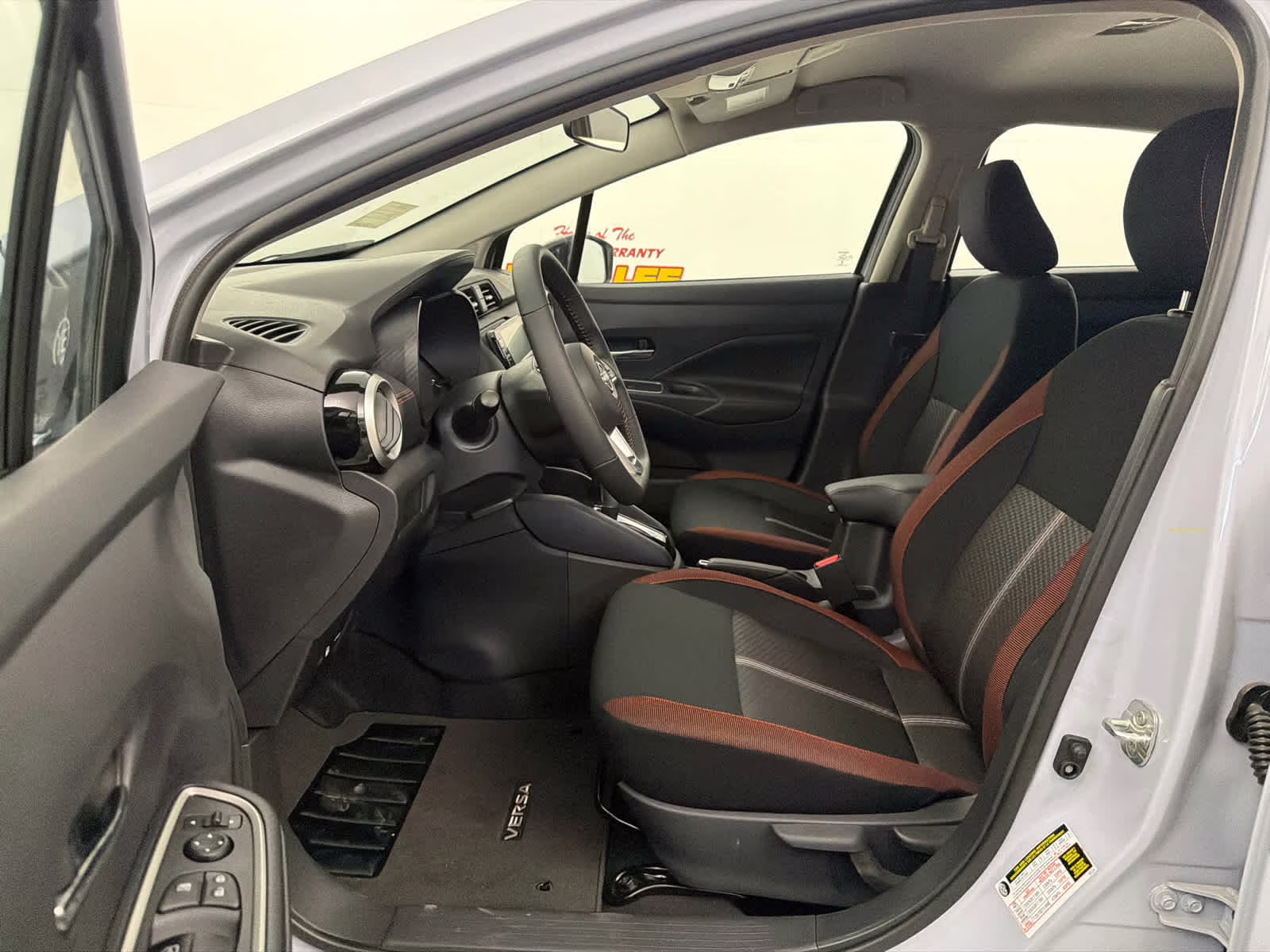 2025 Gray Sky Pearl Nissan Versa SR FWD Sedan