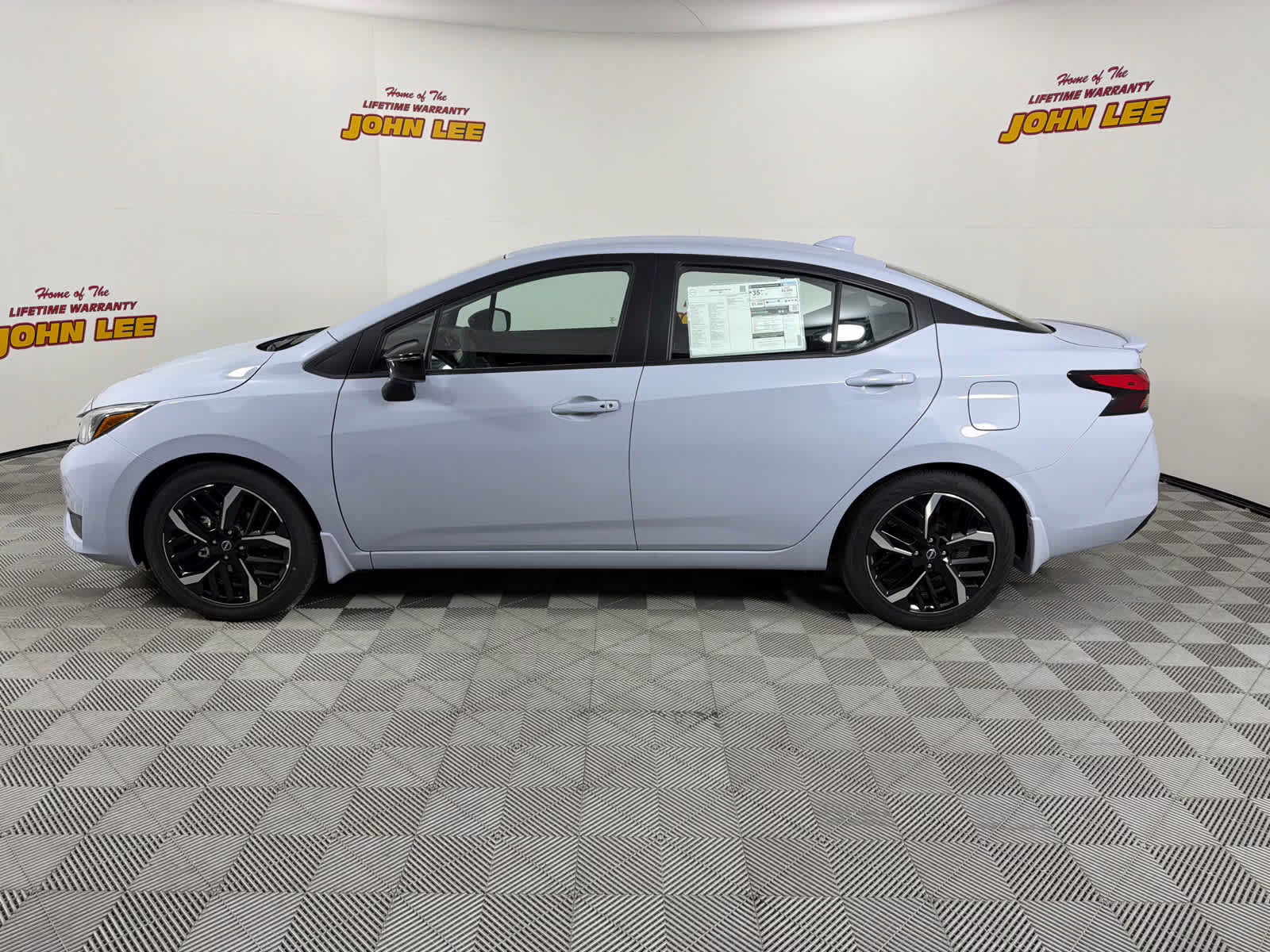 2025 Gray Sky Pearl Nissan Versa SR FWD Sedan