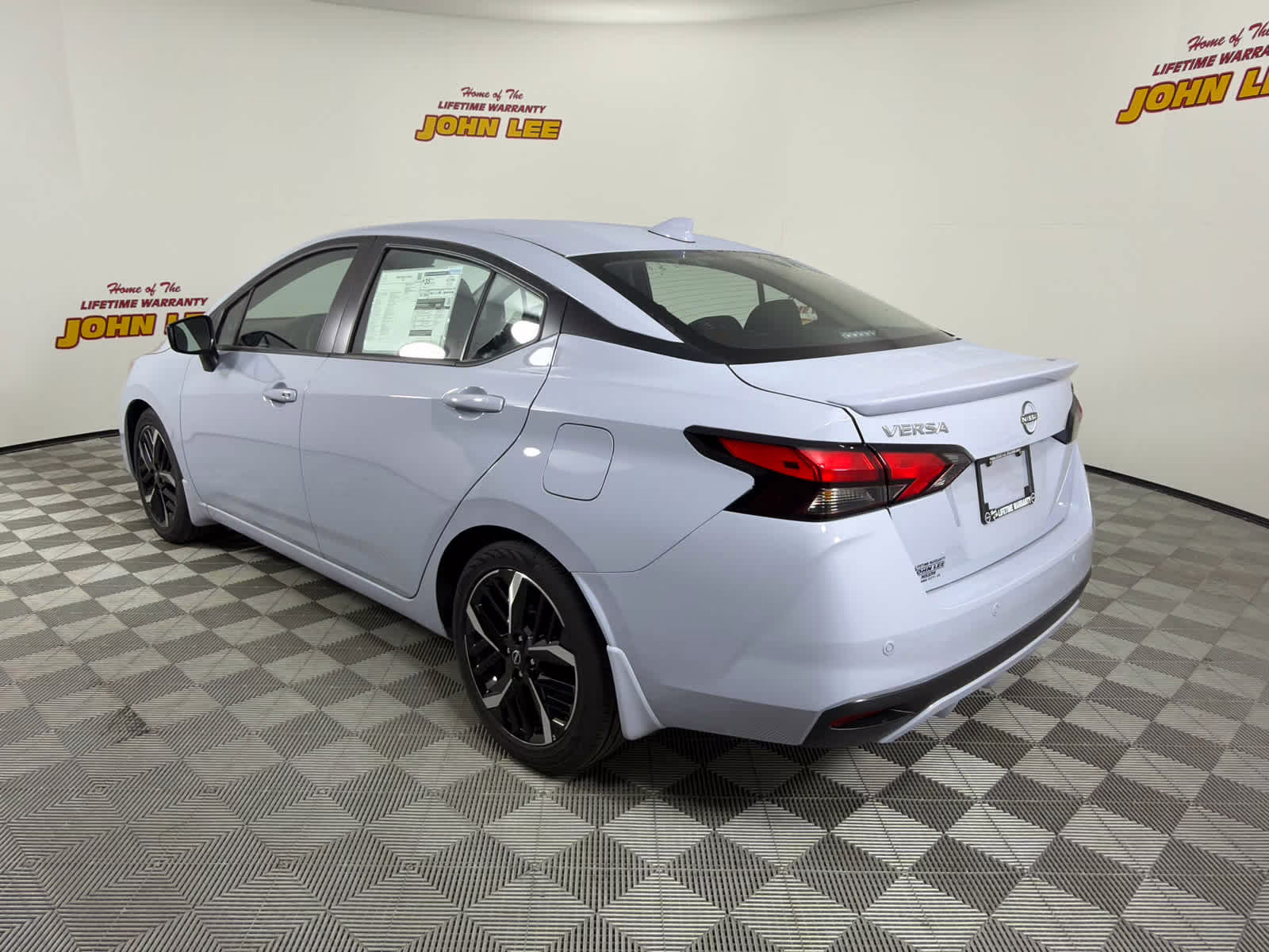 2025 Gray Sky Pearl Nissan Versa SR FWD Sedan