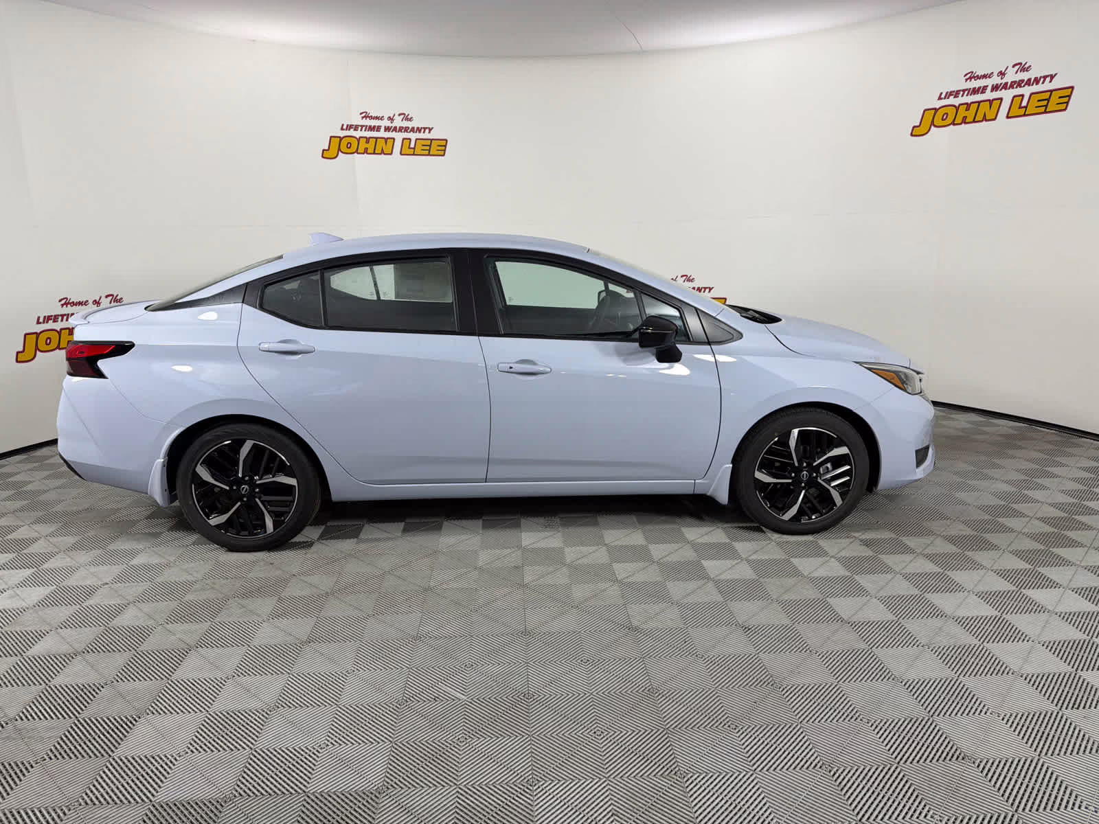 2025 Gray Sky Pearl Nissan Versa SR FWD Sedan