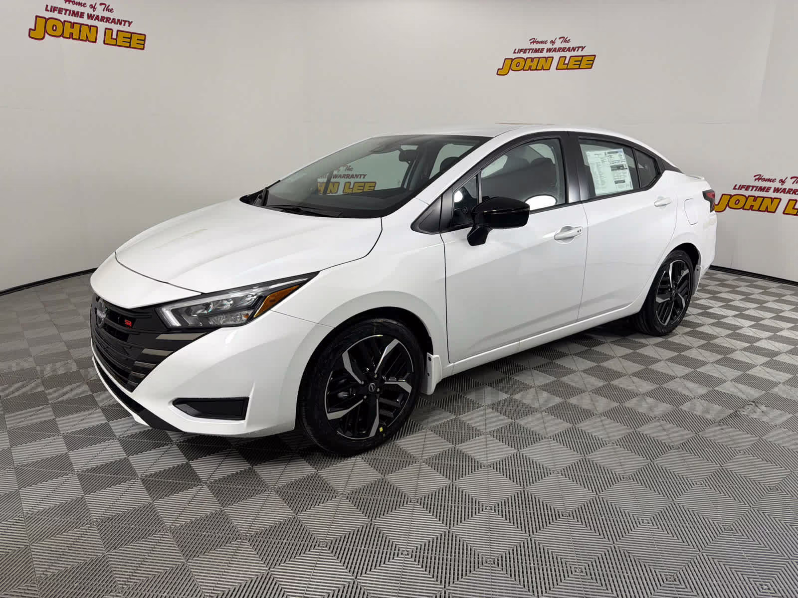 2025 Aspen White Tricoat Nissan Versa SR FWD Sedan