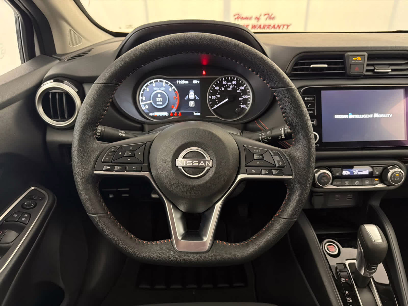 2025 Aspen White Tricoat Nissan Versa SR FWD Sedan