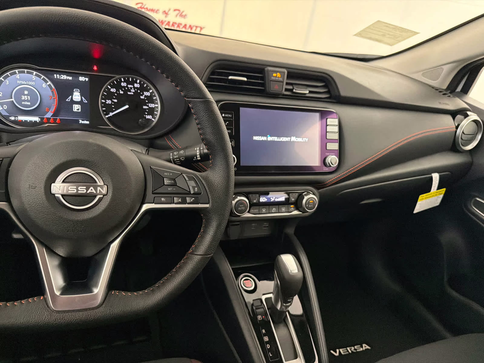 2025 Aspen White Tricoat Nissan Versa SR FWD Sedan