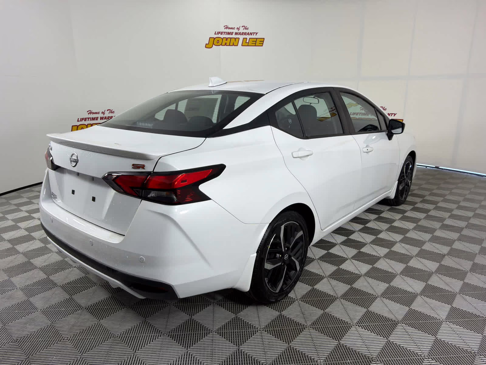 2025 Aspen White Tricoat Nissan Versa SR FWD Sedan