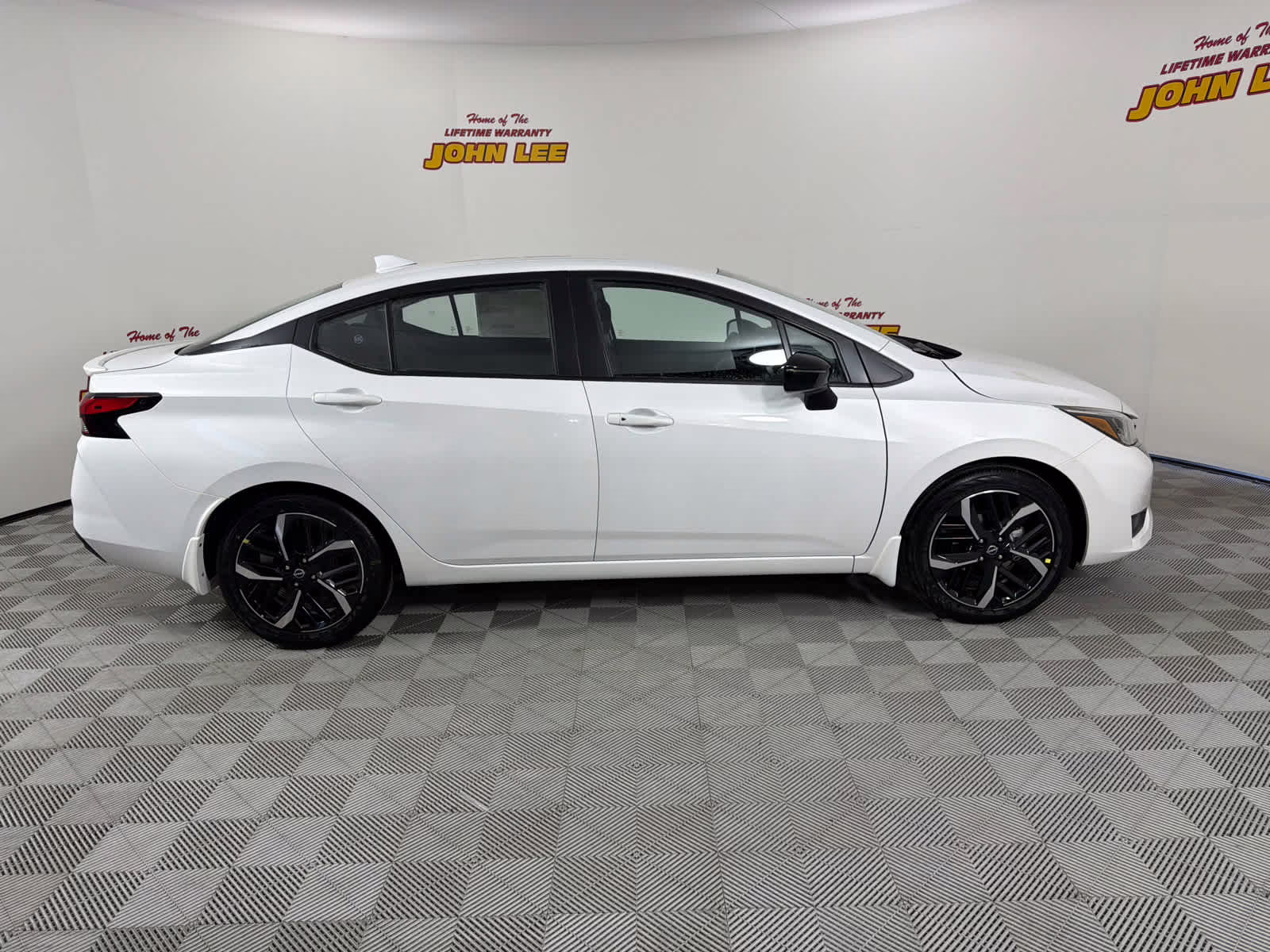 2025 Aspen White Tricoat Nissan Versa SR FWD Sedan