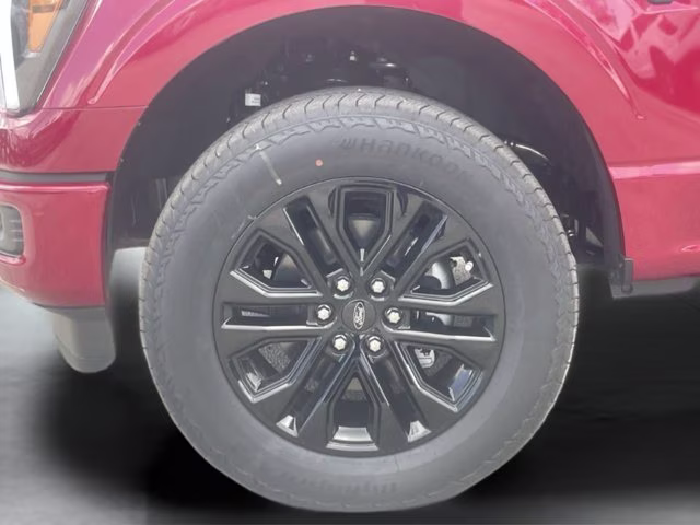 2026 Ruby Red Metallic Tinted Clearcoat Ford F-150 LARIAT 4X4 Truck