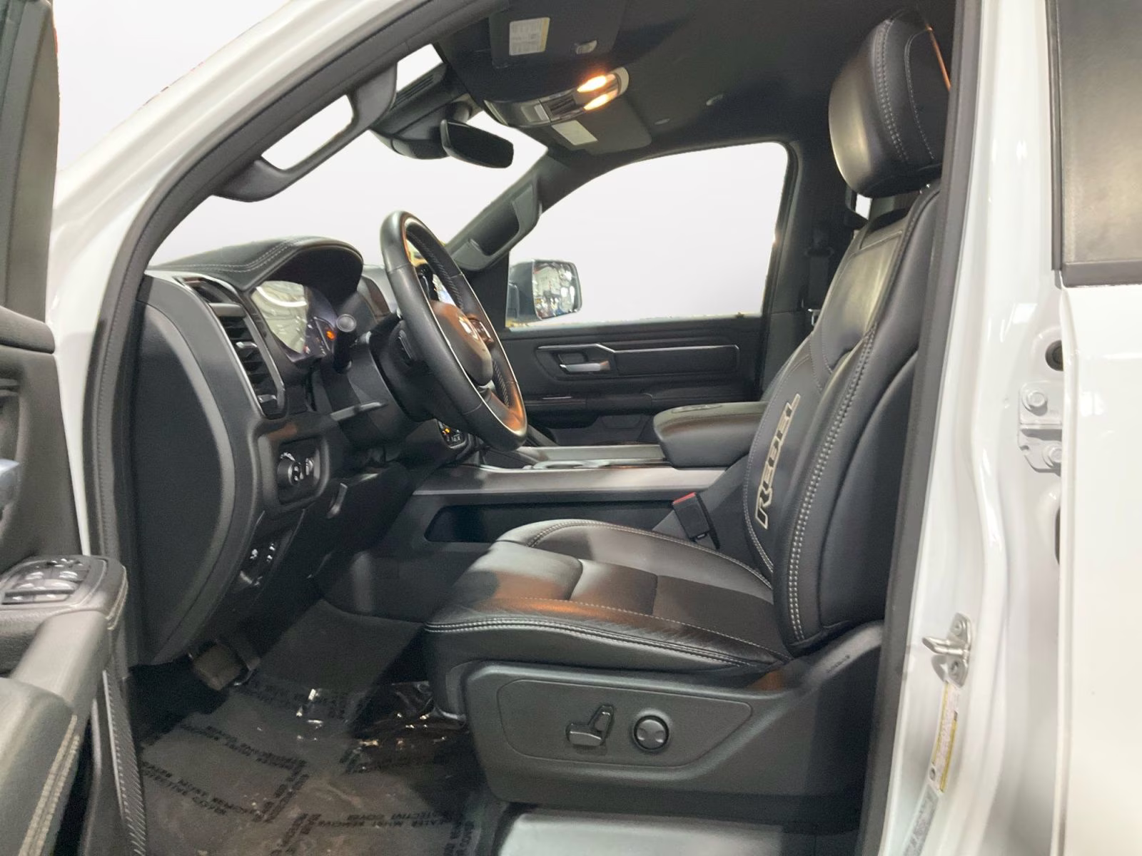 2024 Bright White Clearcoat Ram 1500 Rebel 4X4 Truck