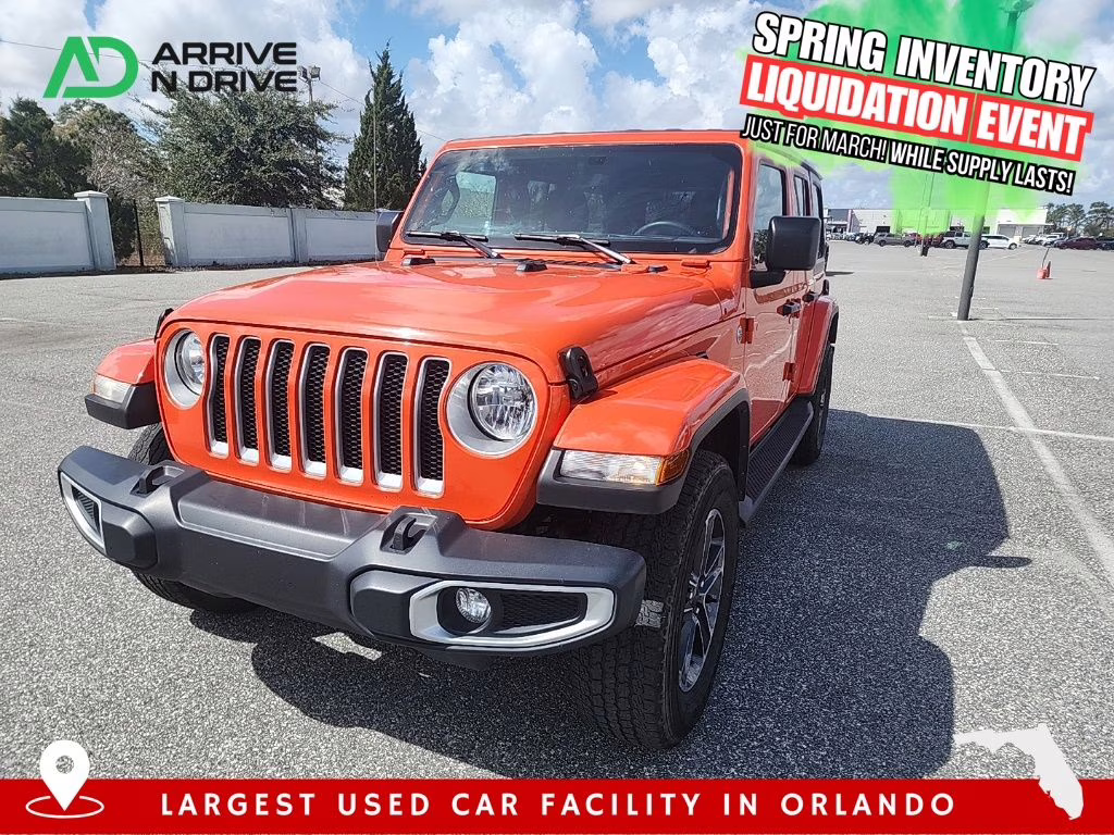 2023 orange Jeep Wrangler Sahara 4X4 SUV