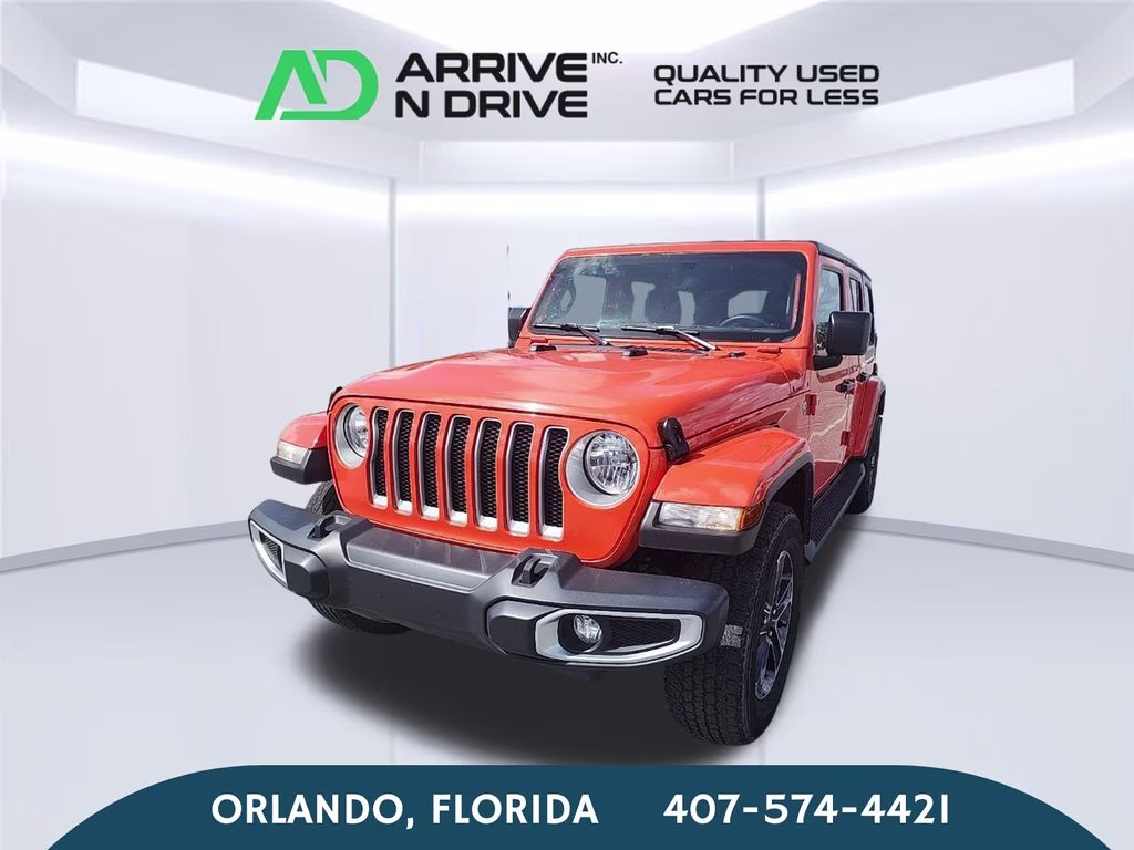 2023 orange Jeep Wrangler Sahara 4X4 SUV