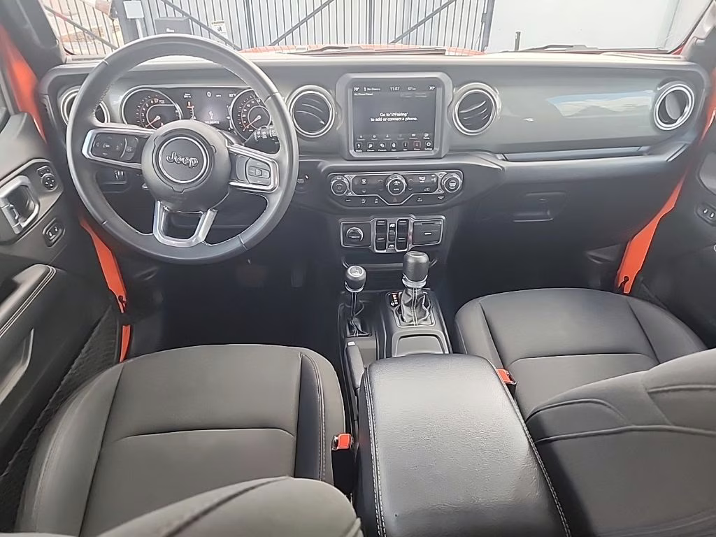 2023 orange Jeep Wrangler Sahara 4X4 SUV