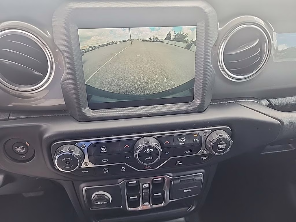 2023 orange Jeep Wrangler Sahara 4X4 SUV