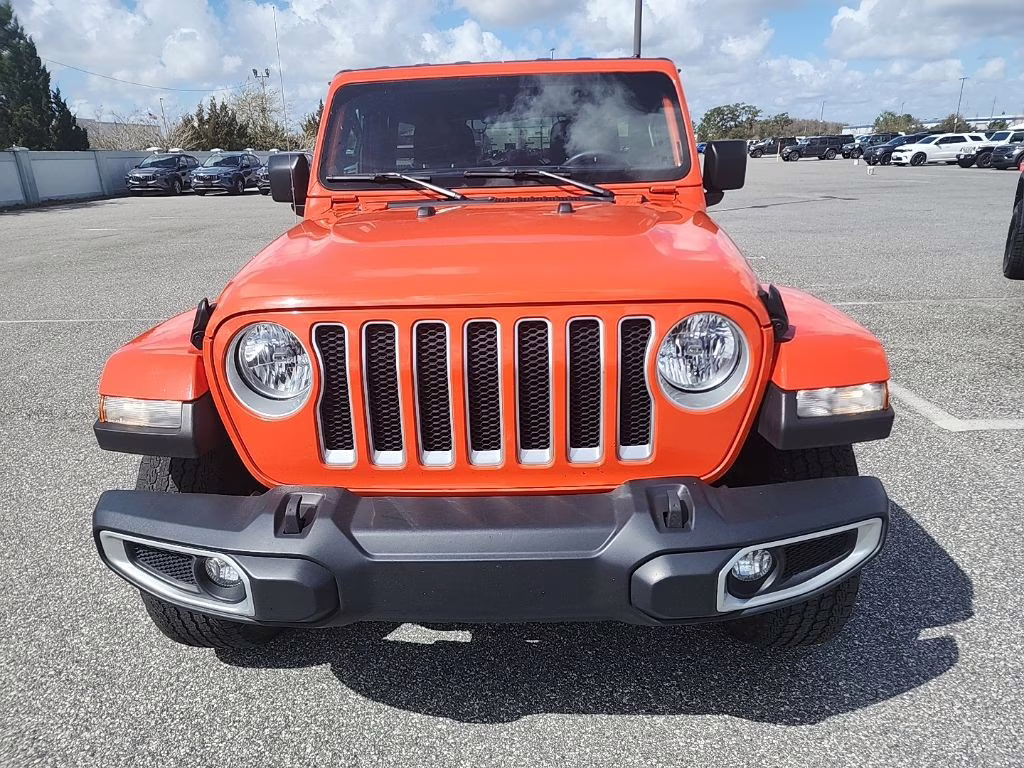 2023 orange Jeep Wrangler Sahara 4X4 SUV