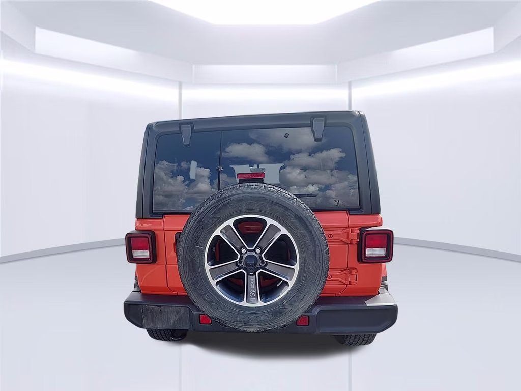 2023 orange Jeep Wrangler Sahara 4X4 SUV