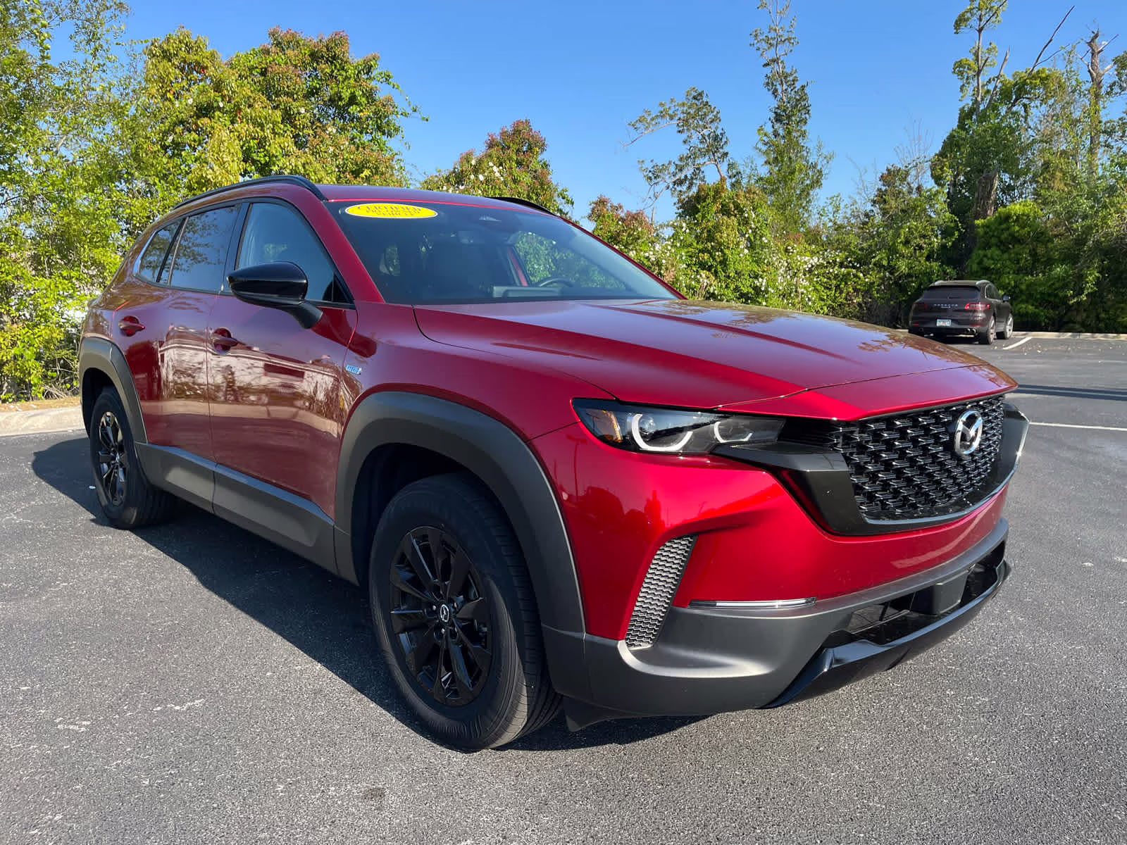 2025 Soul Red Crystal Metallic Mazda CX-50 Hybrid Premium Package AWD SUV