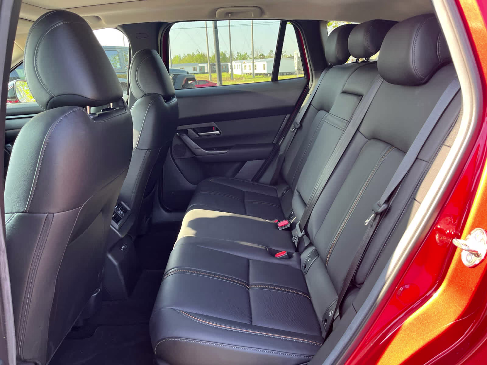 2025 Soul Red Crystal Metallic Mazda CX-50 Hybrid Premium Package AWD SUV