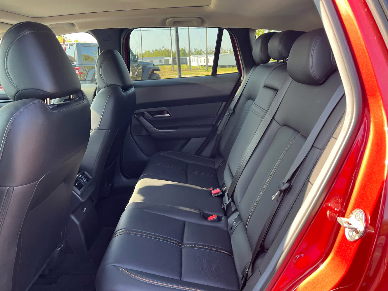 2025 Soul Red Crystal Metallic Mazda CX-50 Hybrid Premium Package AWD SUV