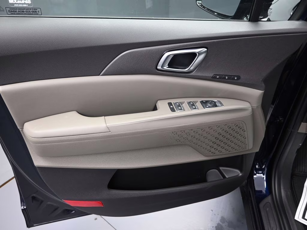 2026 Deep Chroma Blue Kia Carnival Hybrid EX FWD Van