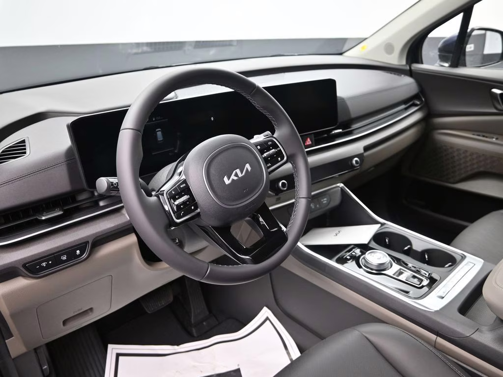 2026 Deep Chroma Blue Kia Carnival Hybrid EX FWD Van