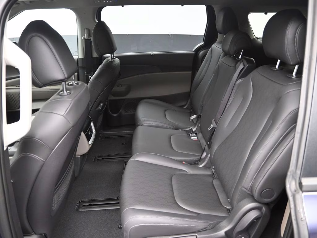 2026 Deep Chroma Blue Kia Carnival Hybrid EX FWD Van