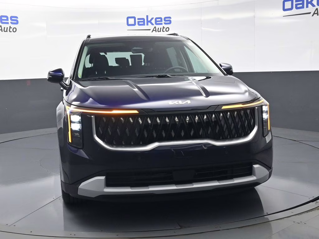 2026 Deep Chroma Blue Kia Carnival Hybrid EX FWD Van