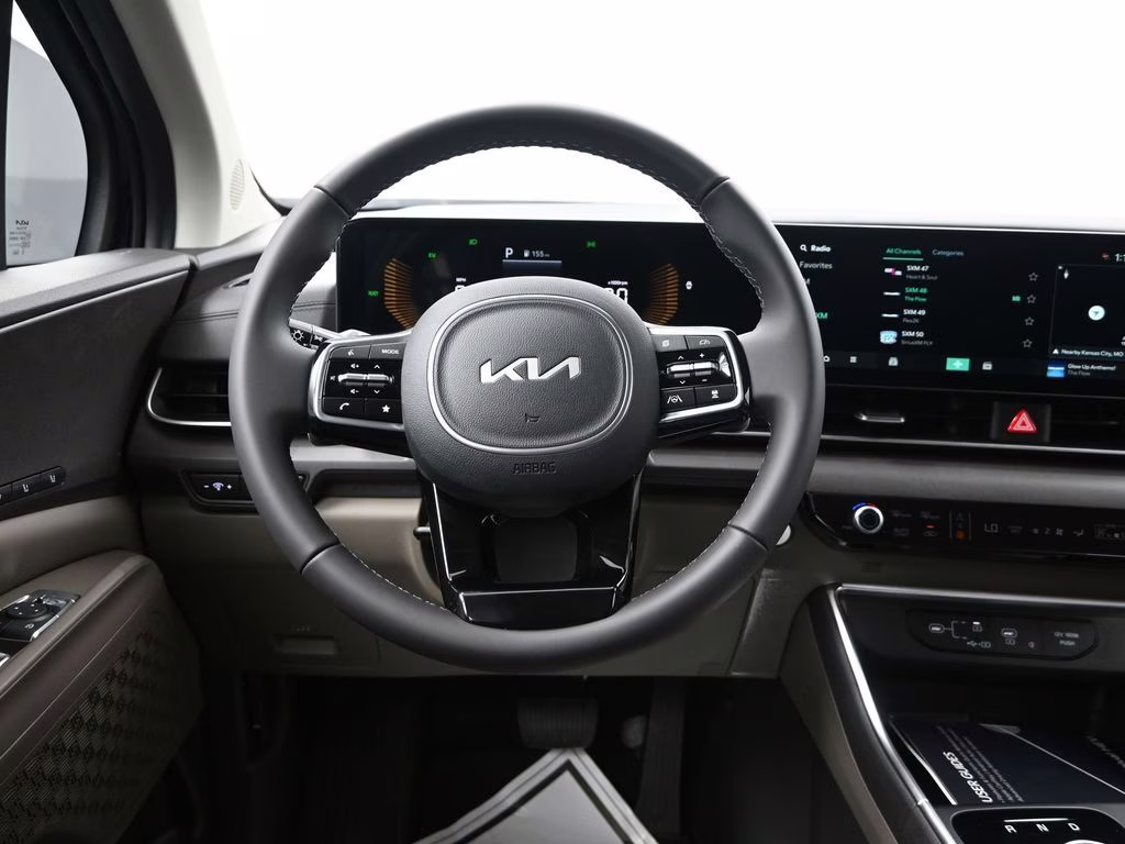 2026 Deep Chroma Blue Kia Carnival Hybrid EX FWD Van