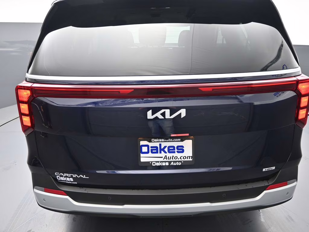 2026 Deep Chroma Blue Kia Carnival Hybrid EX FWD Van