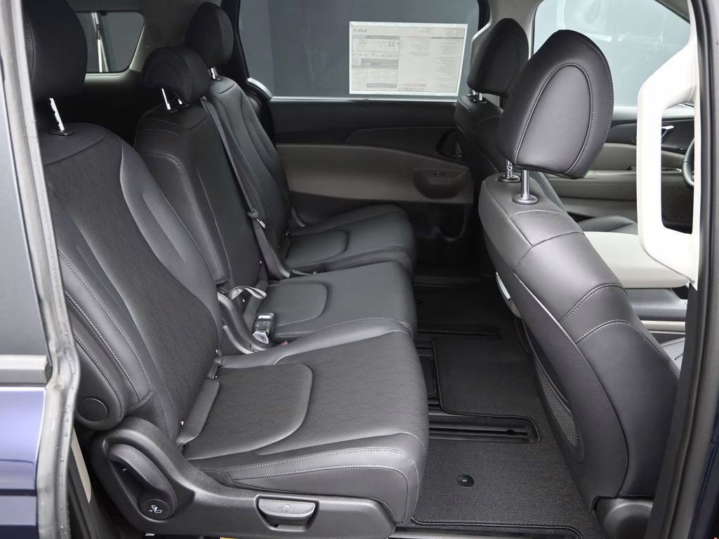 2026 Deep Chroma Blue Kia Carnival Hybrid EX FWD Van