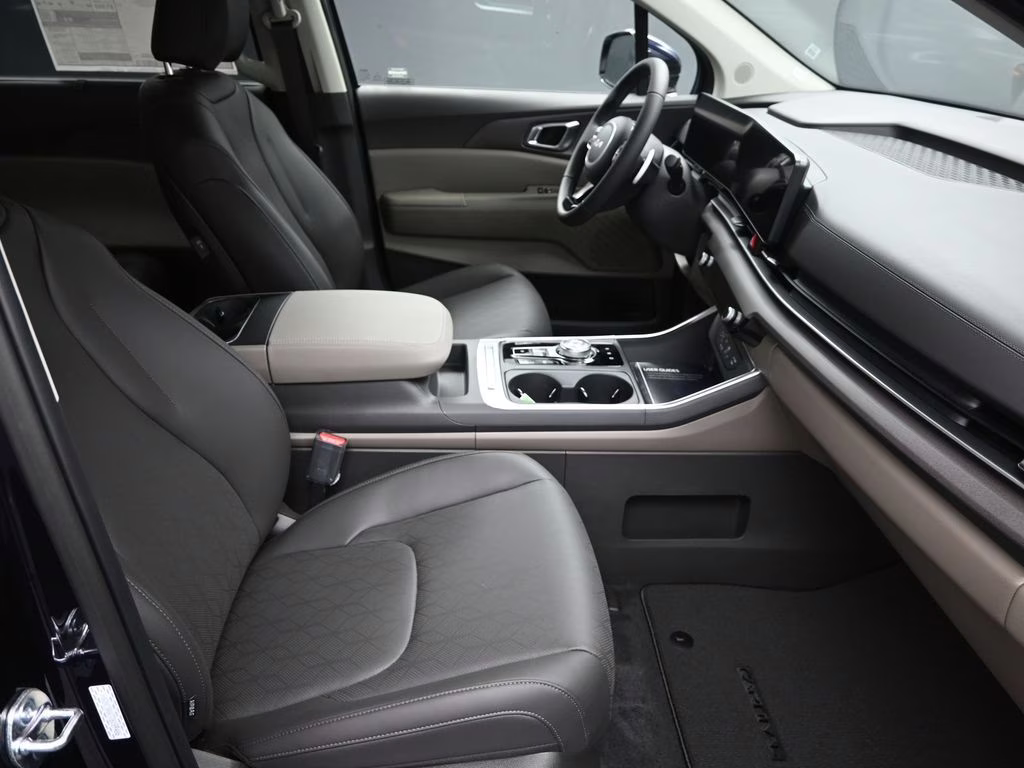 2026 Deep Chroma Blue Kia Carnival Hybrid EX FWD Van