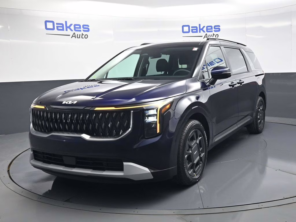 2026 Deep Chroma Blue Kia Carnival Hybrid EX FWD Van