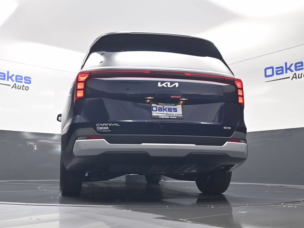 2026 Deep Chroma Blue Kia Carnival Hybrid EX FWD Van