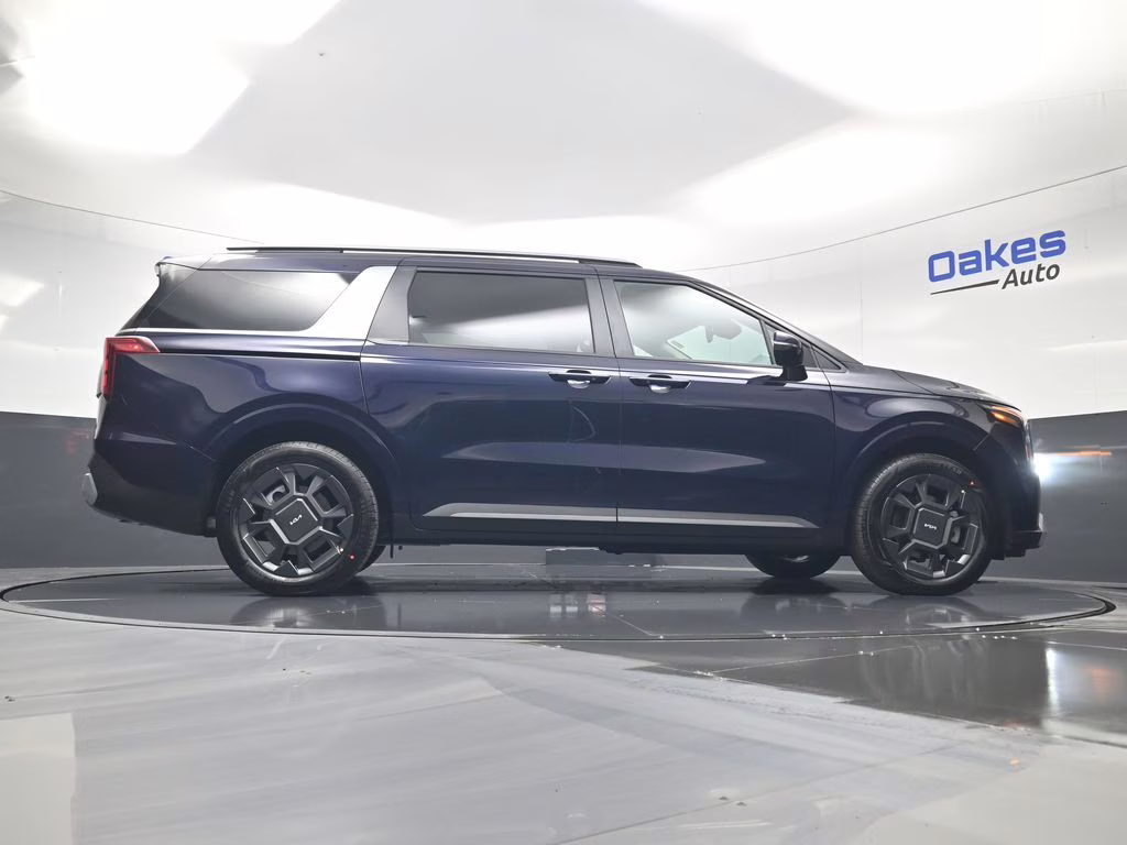 2026 Deep Chroma Blue Kia Carnival Hybrid EX FWD Van
