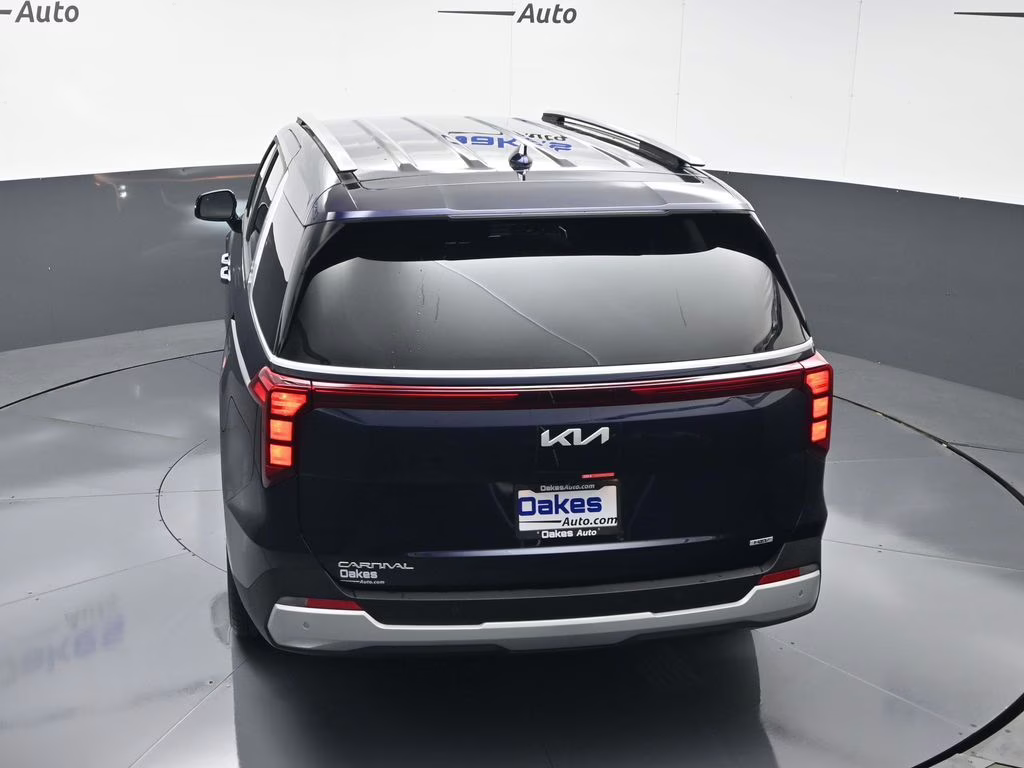2026 Deep Chroma Blue Kia Carnival Hybrid EX FWD Van